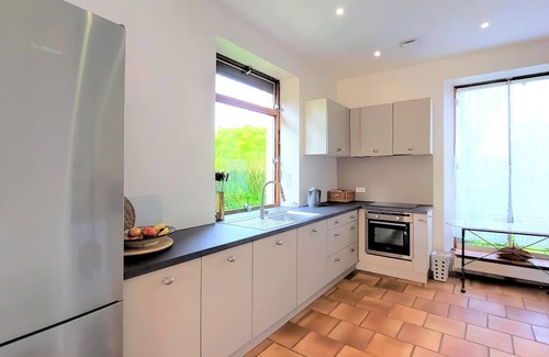 Sand House | Enjoy the tranquility of vacationing in this special vacation home.