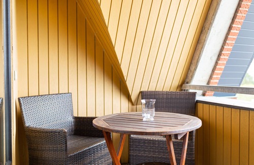 Wittduen Apartment | Enjoy the view of the sandbanks and the Wadden Sea, the boats and the beach.