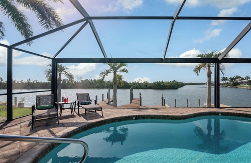 Pelican House | Enjoy the view to the nature reserve from your private pool & spa at Villa Amara