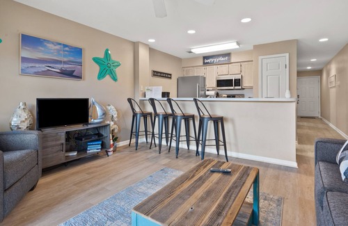 Cherry Grove Beach Condo | Enjoy this cozy villa just 3 blocks from beach-w/large pool and whirlpool, budget-friendly