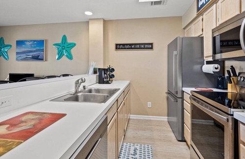 Cherry Grove Beach Condo | Enjoy this cozy villa just 3 blocks from beach-w/large pool and whirlpool, budget-friendly