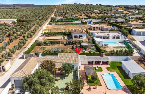 Setenil de las Bodegas House | Enjoy your vacation in this attractive vacation home with pool.