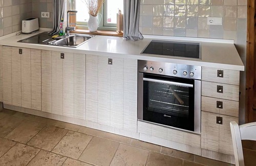 Fehmarnsund Apartment | Enjoy your vacation: Terrace, fireplace & sea view at BEACHHOUSE-Fehmarn -Ostwind