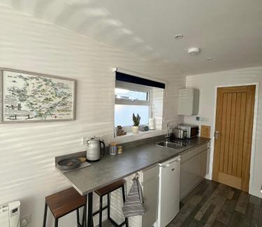 Rhoscolyn Apartment | Entire guest suite in Four Mile Bridge, Rhoscolyn
