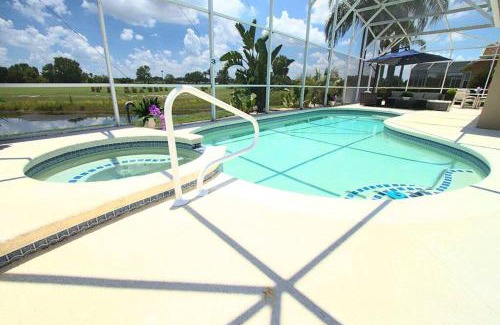 Ridgewood Lakes House | Entire home with pool and lake view and Golf course by Disney