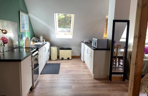 Westport Apartment | Entire studio with balcony and riverside decking.