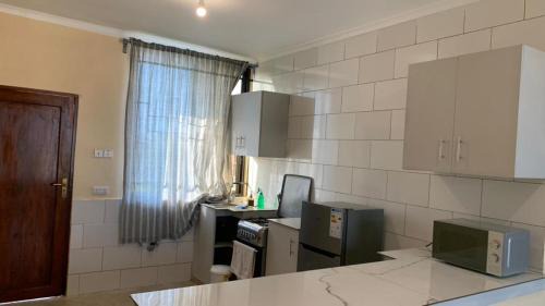 Mlingotini Apartment | Entire two apartments, four bedrooms in Dar es salaam