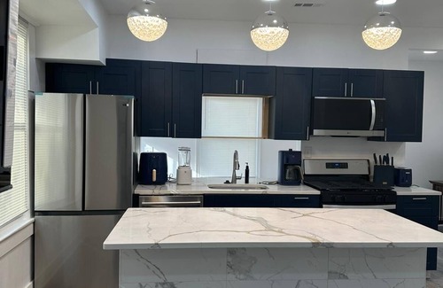 Randle Highlands House | Entire two kitchen home including basement studio w/parking, deck, and yard.
