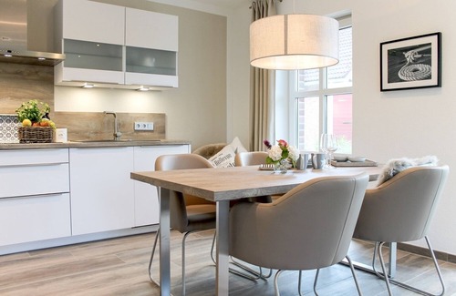Greetsiel Apartment | Entspannung Pur: Moderne Ferienwohnung 'viel Meer' mit Sauna und Garten