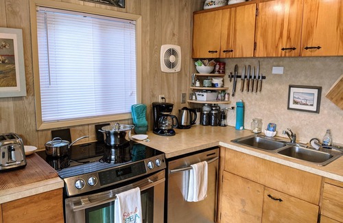 Rockaway Beach House | Escape from it all at this 1 acre beachfront getaway