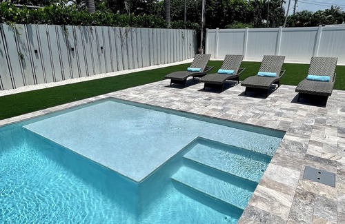 Coral Heights House | Escape in Backyard Oasis! Saltwater heated pool, 2 miles to the beach!