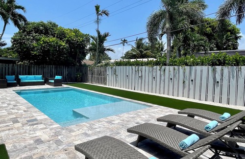 Coral Heights House | Escape in Backyard Oasis! Saltwater heated pool, 2 miles to the beach!