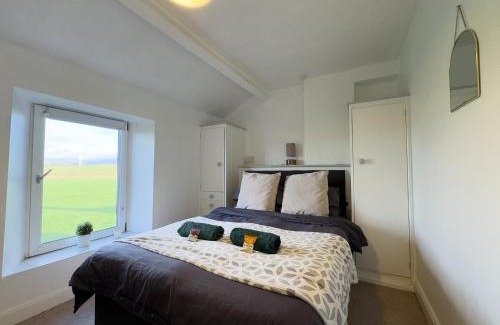 Calder Bridge House | Escape to our Cosy Cottage with Log Burner in Drigg, Lake District