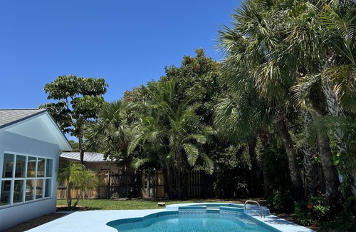 South Patrick Shores House | Escape to Paradise! Stunning Poolside Haven Just Moments from the Shore.