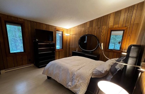 Port Franks Cottage | Escape to the Forest: Beach Access, Jacuzzi, and Cozy Fireplace