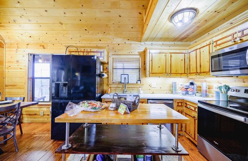 Hochatown Cabin | Escape to The Llama Lodge, a family-friendly retreat nestled among the towering