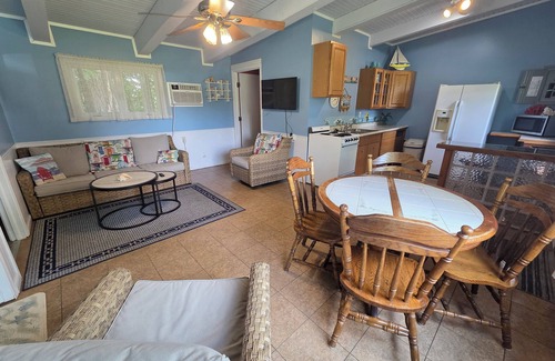 Fulton Cottage | Escape to the quiet countryside and relax at our cozy beach-themed cottage.