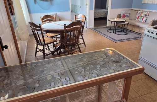 Fulton Cottage | Escape to the quiet countryside and relax at our cozy beach-themed cottage.