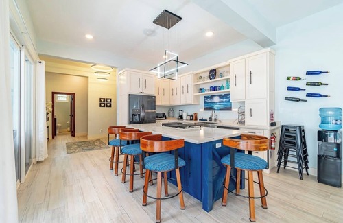 San Pedro House | Escape to this stunning 4-bedroom villa nestled on the white sands of northern Ambergris Caye, Belize.