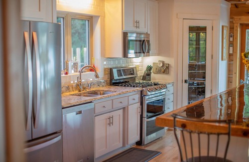 Baileys Harbor House | "Escape to tranquility and serenity at this family retreat lake house."