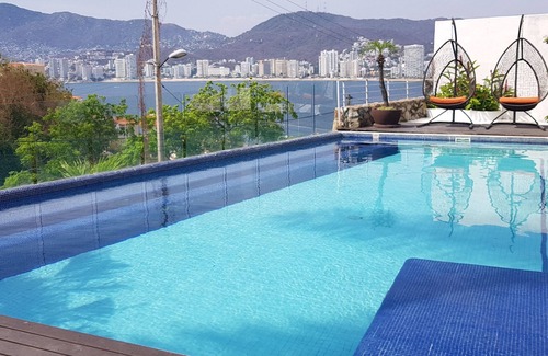 Playa Guitarron House | Espectacular casa en Brisas Guitarron con la mejor vista a la Bahia
