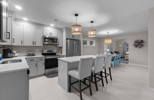 Kitty Hawk House | EV Charging Outer Banks Haven Walk to Beach Pet Friendly New Kitchen Outdoors
