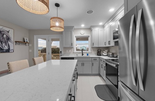 Kitty Hawk House | EV Charging Outer Banks Haven Walk to Beach Pet Friendly New Kitchen Outdoors