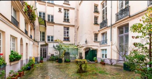Les Iles Apartment | Evasion sensorielle à L'Ile Saint Louis Notre Dame de Paris
