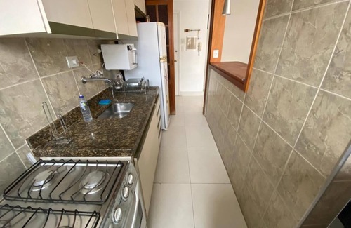 Gonzaga Apartment | Excellent apartment, right on the sand, in front of Praia do Gonzaga in Santos,