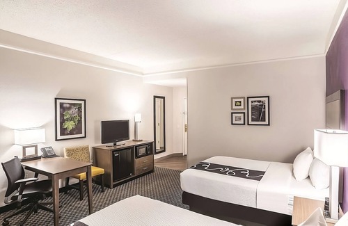 Woodlands Village Hotel | Excellent Choice! Swimming Pool, Outdoor Hot Tub, near Arizona Snowbowl