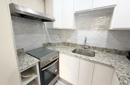 Coral Gardens Apartment | Exceptional 2 bed/2 bath penthouse w/balconynoverlooking the Caribbean Sea.