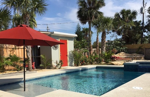 Port Canaveral House | Exceptional! Private Oasis, Steps to Beach, Tropical Garden w/Heated Pool, Spa.