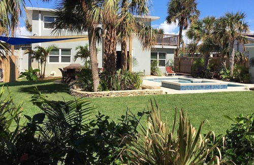 Port Canaveral House | Exceptional! Private Oasis, Steps to Beach, Tropical Garden w/Heated Pool, Spa.