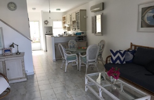 Jolly Harbour House | Exceptional waterfront villa, short walk to beautiful secluded beach.