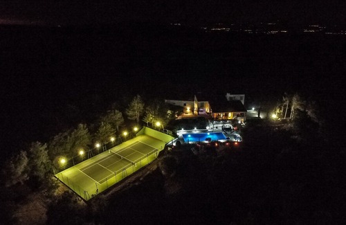 Roullens House | Exceptionally Private Estate with Tennis, large Heated Pool and superb views.