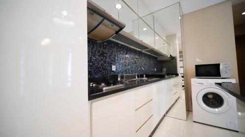 Surabaya Apartment | Exclusive 2BR Connected to Mall Apartment at Aryaduta Residence Surabaya By Travelio