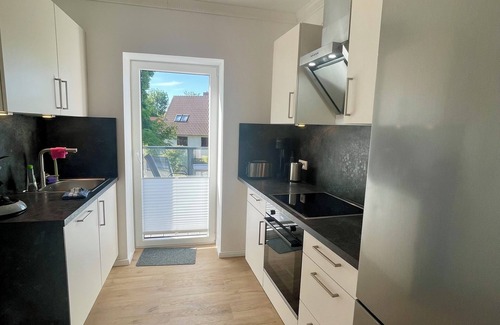 Altefaehr Apartment | Exclusive apartment with harbor view - 200m to the south beach on the island of Rügen