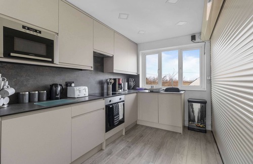 Pevensey House | Exclusive Beachfront Home with Panoramic Views & Family Fun.