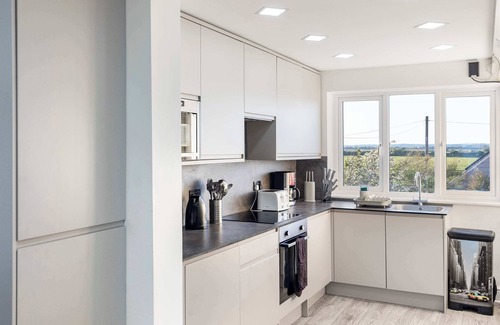 Pevensey House | Exclusive Beachfront Home with Panoramic Views & Family Fun.