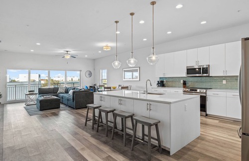 Madeira Beach Condo | Exclusive PENTHOUSE Footsteps from Madeira Beach! 3BR/3BA with a Heated Pool!