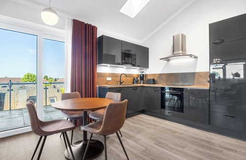 Wangerland Apartment | Exclusive penthouse 'Haubentaucher' - Luxurious North Sea time-out.