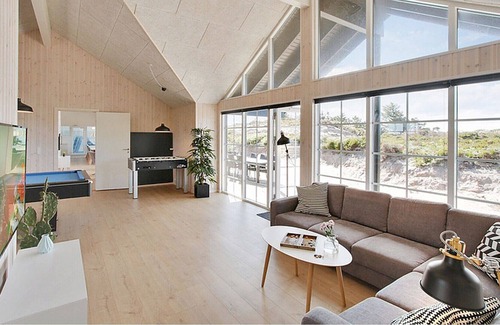 Henne Strand House | Exclusive pool holiday home with activity room on the beautiful North Sea