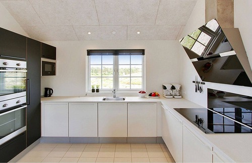 Henne Strand House | Exclusive pool holiday home with activity room on the beautiful North Sea