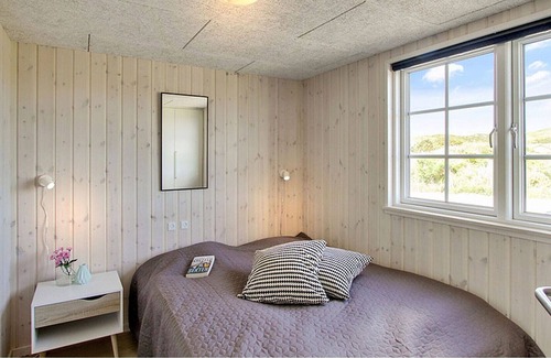 Henne Strand House | Exclusive pool holiday home with activity room on the beautiful North Sea