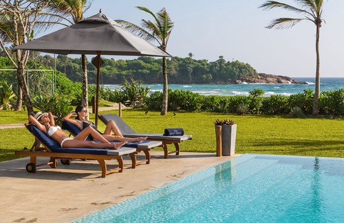 Dickwella Villa | exclusive use of luxury fully staffed beach front 4 bed villa with private pool