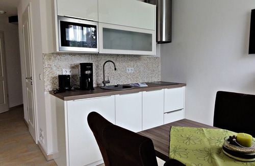 Sellin Apartment | Exclusively by the sea, swimming pool-sauna-parking free WiFi, wellness gg. fee