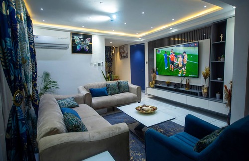 Kumasi Apartment | Exec 2BR Aptmt with modern kitchen, WiFi, cozy bedrooms, study area, and hall