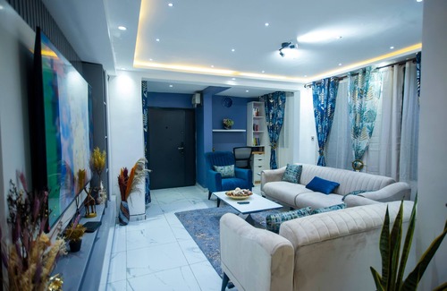 Kumasi Apartment | Exec 2BR Aptmt with modern kitchen, WiFi, cozy bedrooms, study area, and hall
