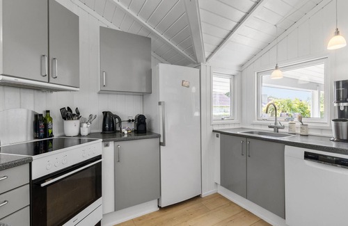 Kirke Hyllinge House | Experience a wonderful break in this holiday home with fjord views.