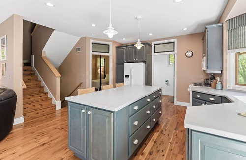 Port Sheldon House | Experience luxury at Lakefront Villa, a spacious 5-bedroom retreat - stunning lake views.